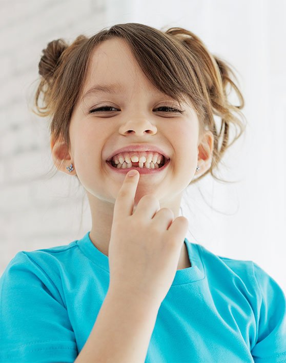 Girl with missing tooth - Harrison Pediatric Dentistry