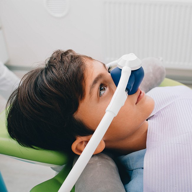 Boy undergoing sedation dentistry treatment - Harrison Pediatric Dentistry